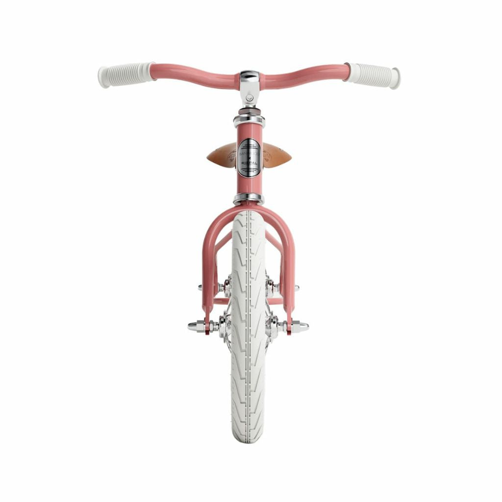 Front view of the rose coloured Banwood Icon Balance Bike